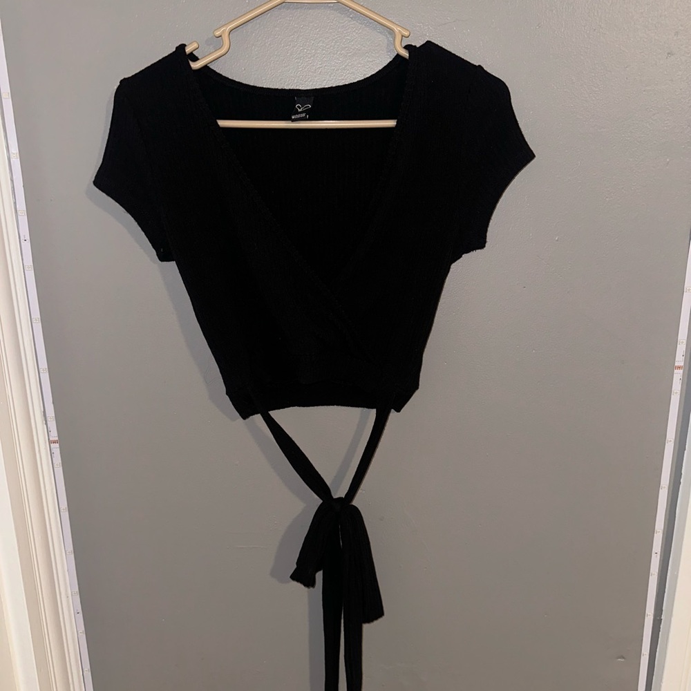 Short sleeve low cut with tie back in size medium